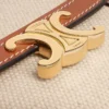 Liten plånbok med lock Triomphe i textil och kalvskinn Liten plånbok med lock Triomphe i textil och kalvskinn
