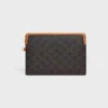 Liten påse med rem Cuir Triomphe i Triomphe Canvas och kalvskinn