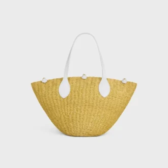 Liten Triomphe-korg med pärlor i sisal och kalvskinn