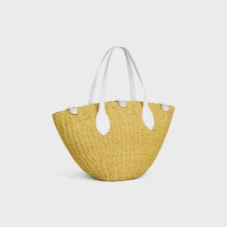 Liten Triomphe-korg med pärlor i sisal och kalvskinn