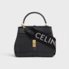 Lång rem i ull med CELINE-jacquard