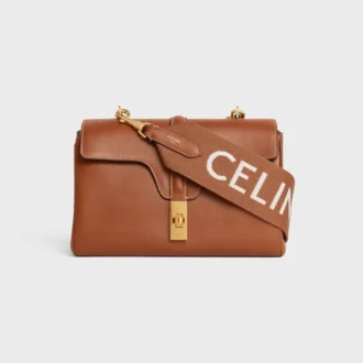 Lång rem i ull med CELINE-jacquard och gulddetaljer