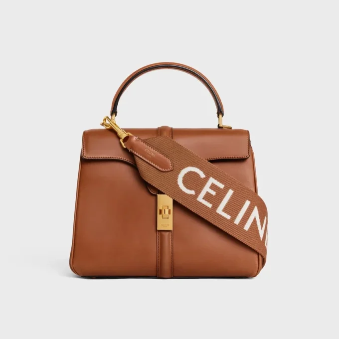 Lång rem i ull med CELINE-jacquard och gulddetaljer
