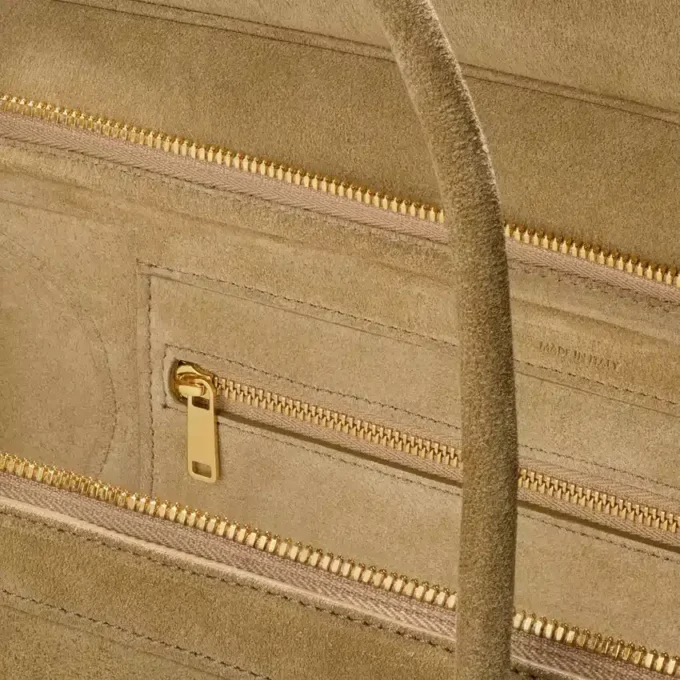 Luggage i kalvskinn i mocka