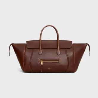 Luggage i mjukt, glansigt lammskinn
