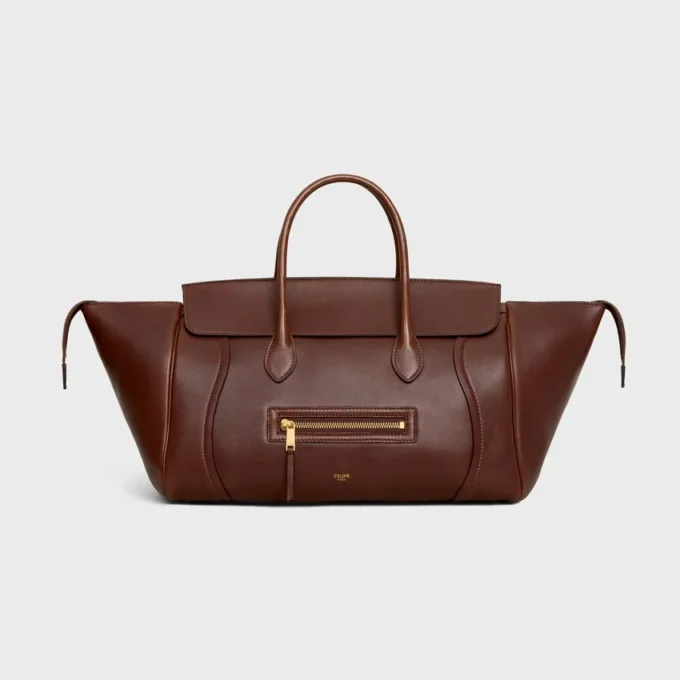 Luggage i mjukt, glansigt lammskinn