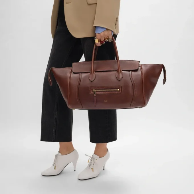 Luggage i mjukt, glansigt lammskinn