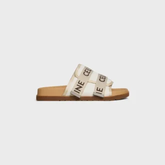 Pitea-sandal i canvas med « CELINE »-jacquard