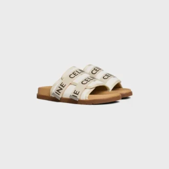 Pitea-sandal i canvas med « CELINE »-jacquard