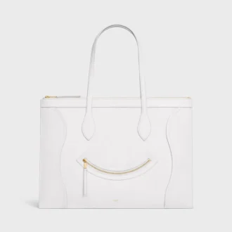 Platt luggage i glansigt kalvskinn
