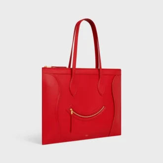 Platt luggage i glansigt kalvskinn