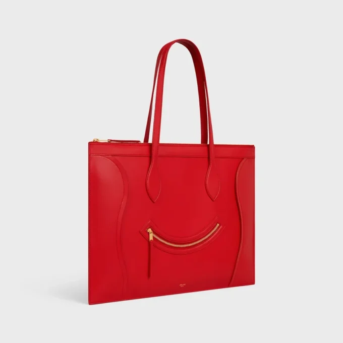 Platt luggage i glansigt kalvskinn