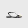 Platta sandaler med burdesign i getskinn