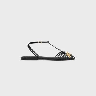 Platta sandaler med burdesign i getskinn