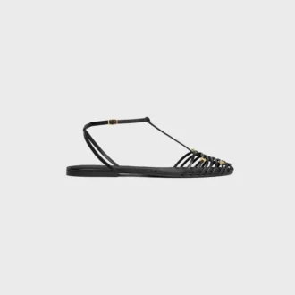 Platta sandaler med burdesign i getskinn