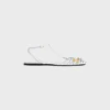 Platta sandaler med burdesign i getskinn