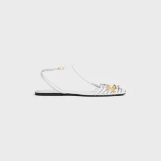 Platta sandaler med burdesign i getskinn