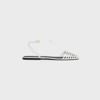 Platta sandaler med burdesign i getskinn