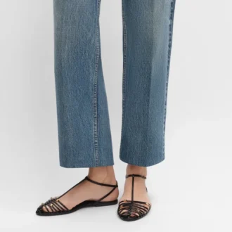 Platta sandaler med burdesign i getskinn