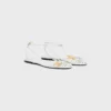 Platta sandaler med burdesign i getskinn
