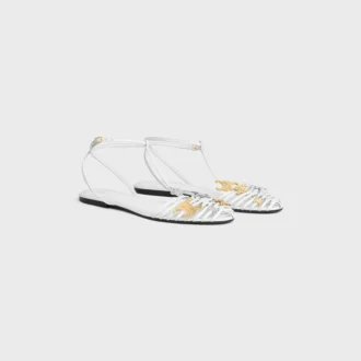 Platta sandaler med burdesign i getskinn