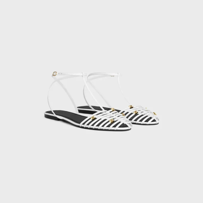 Platta sandaler med burdesign i getskinn Platta sandaler med burdesign i getskinn