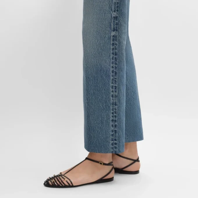 Platta sandaler med burdesign i getskinn