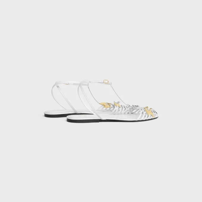 Platta sandaler med burdesign i getskinn