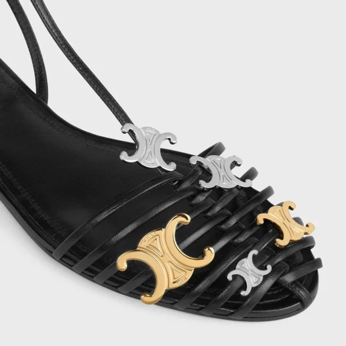 Platta sandaler med burdesign i getskinn