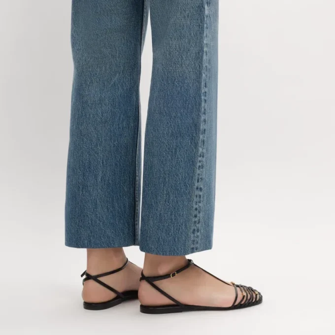 Platta sandaler med burdesign i getskinn