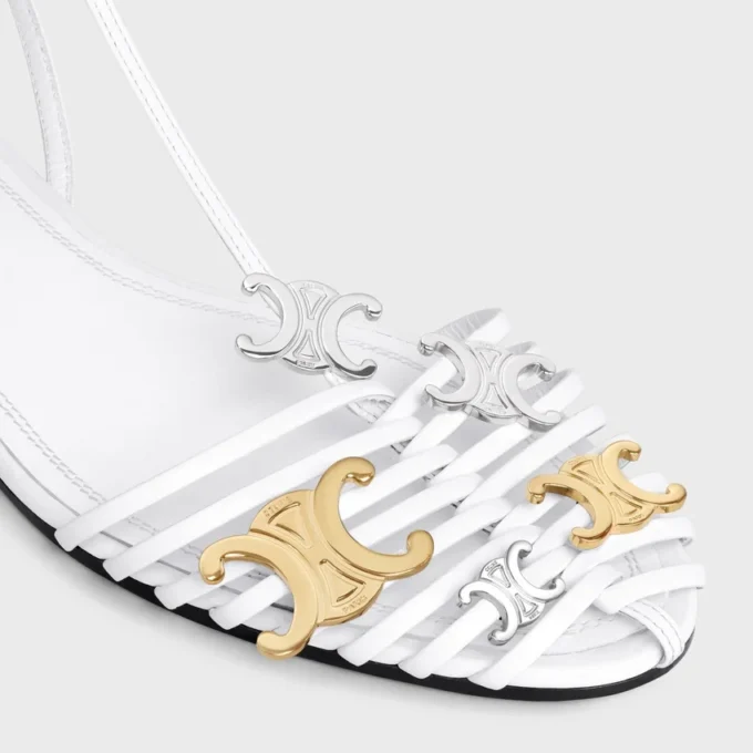 Platta sandaler med burdesign i getskinn