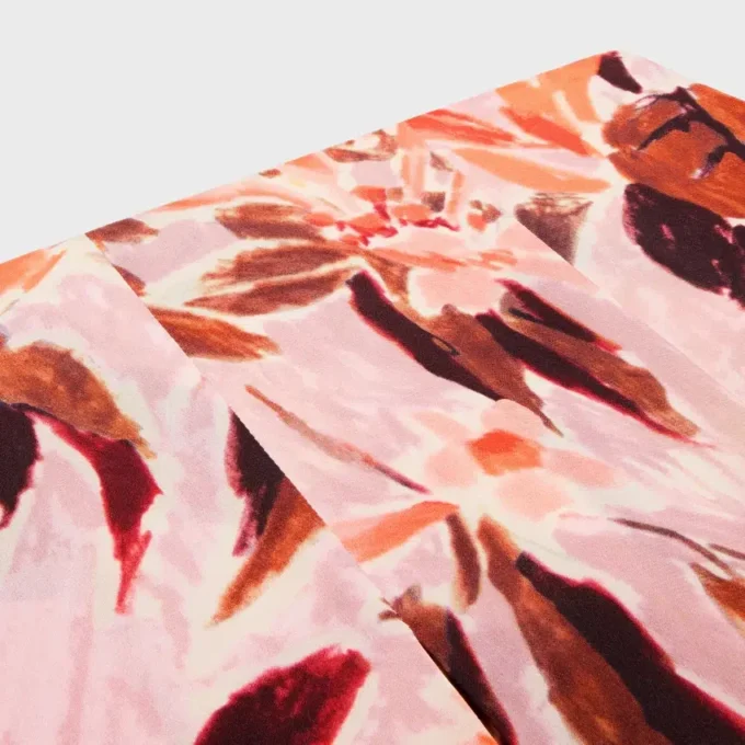Plisserad kjol i crepe de chine