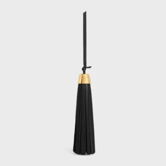 Tassel-berlock i slätt lammskinn