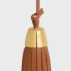 Tassel-berlock i slätt lammskinn Tassel-berlock i slätt lammskinn