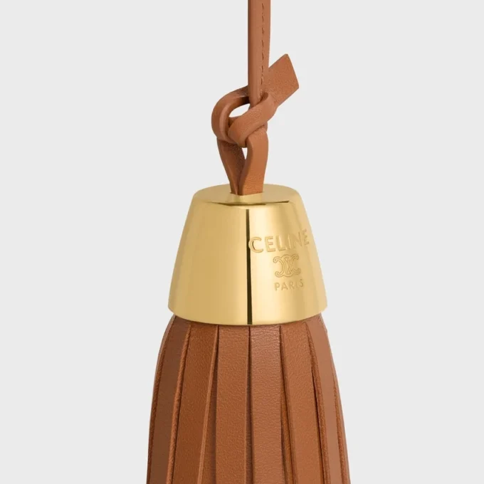 Tassel-berlock i slätt lammskinn Tassel-berlock i slätt lammskinn