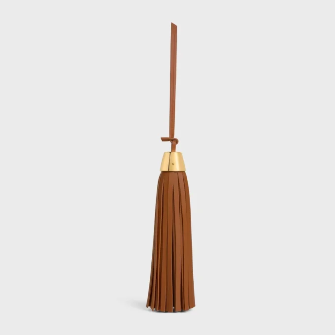 Tassel-berlock i slätt lammskinn Tassel-berlock i slätt lammskinn