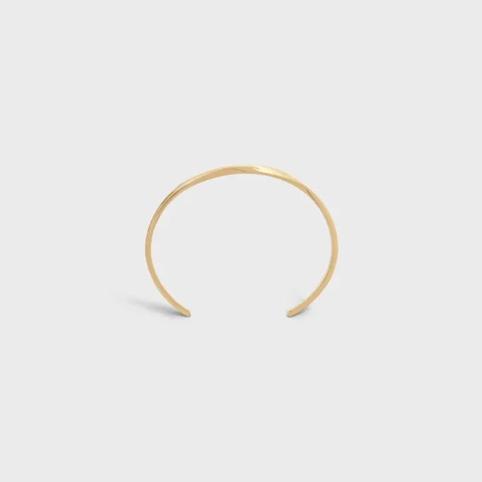 Torsion-armband i gult guld