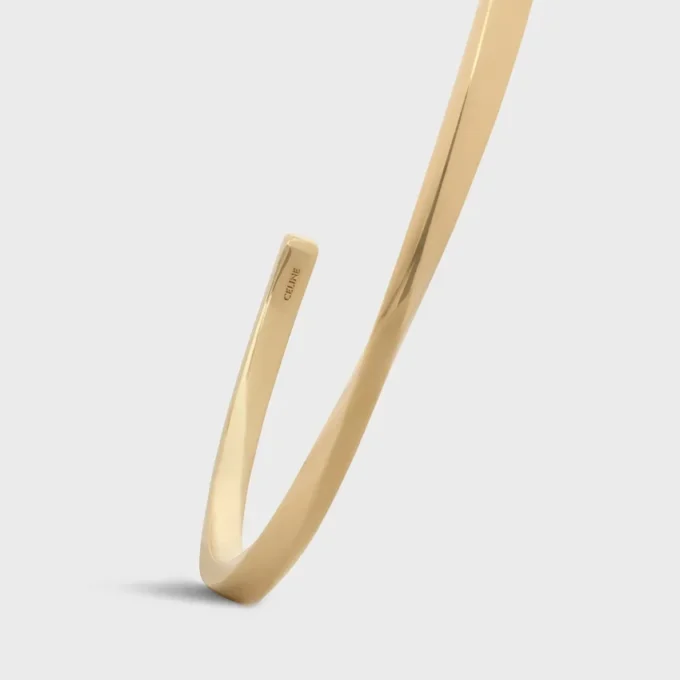 Torsion-armband i gult guld