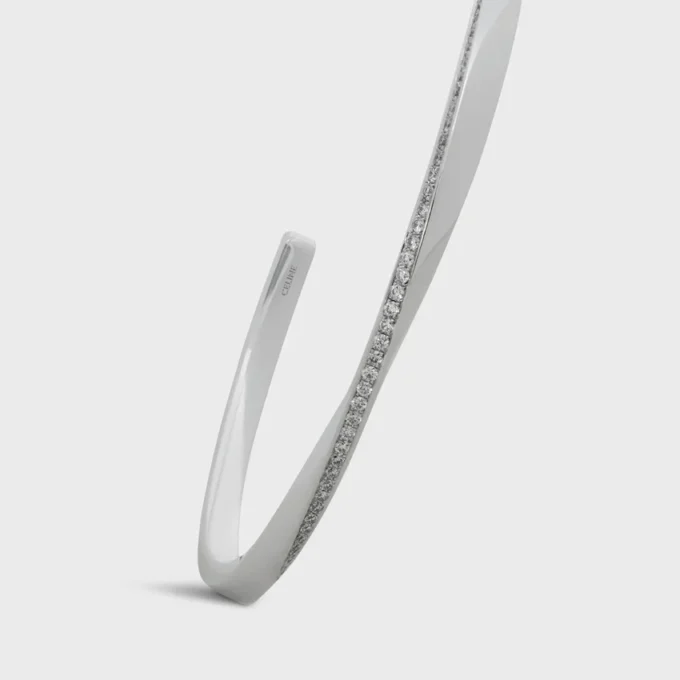 Torsion-armband i vitt guld och diamanter