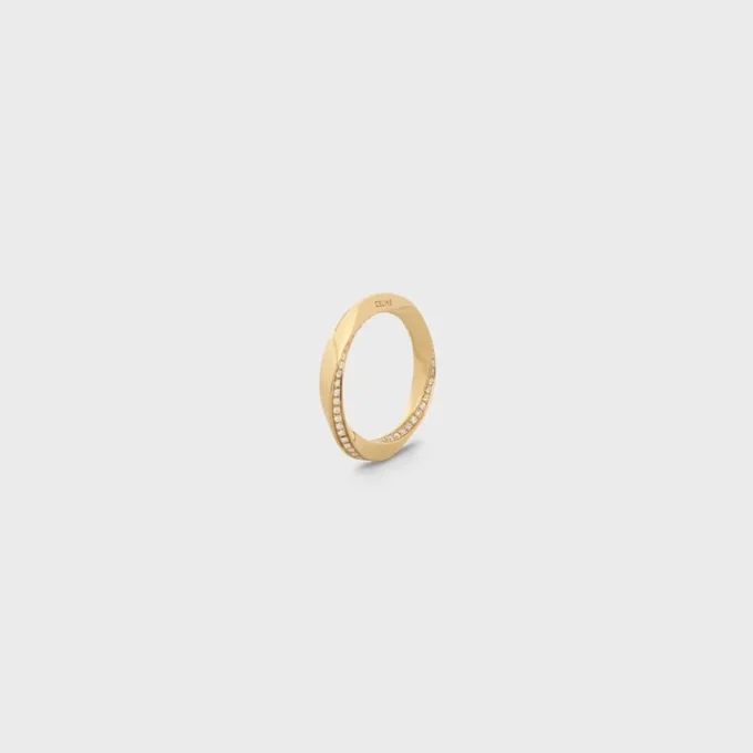 Torsion-ring i gult guld och diamanter Torsion-ring i gult guld och diamanter