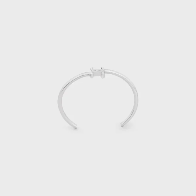 Triomphe asymmetrisk armring i mässing med rodiumfinish
