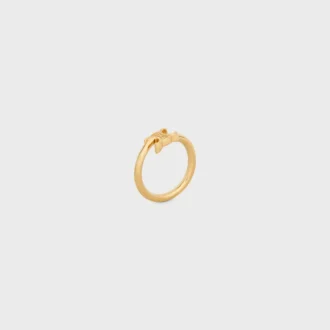 Triomphe asymmetrisk ring i mässing med guldfinish