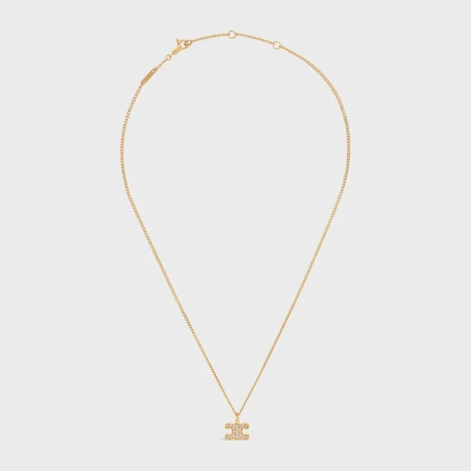 Triomphe-halsband i mässing med guldfinish och strass