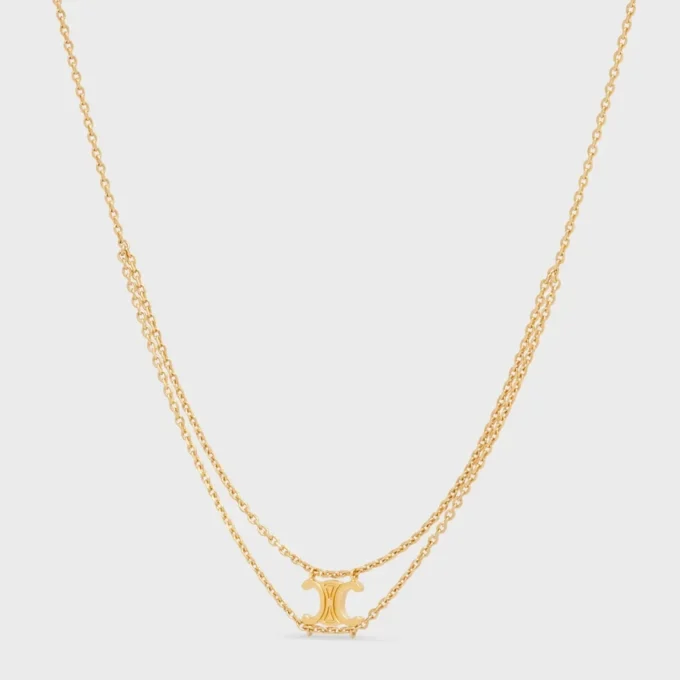 Triomphe hängande halsband i mässing med guldfinish Triomphe hängande halsband i mässing med guldfinish