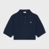 Triomphe kort polo i ull Triomphe kort polo i ull