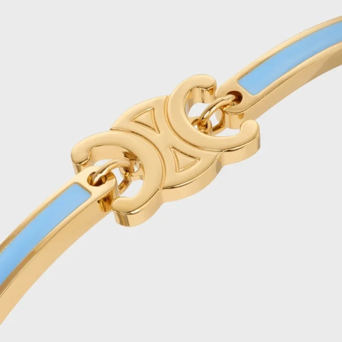Triomphe ledat armband i emalj och mässing med guldfinish