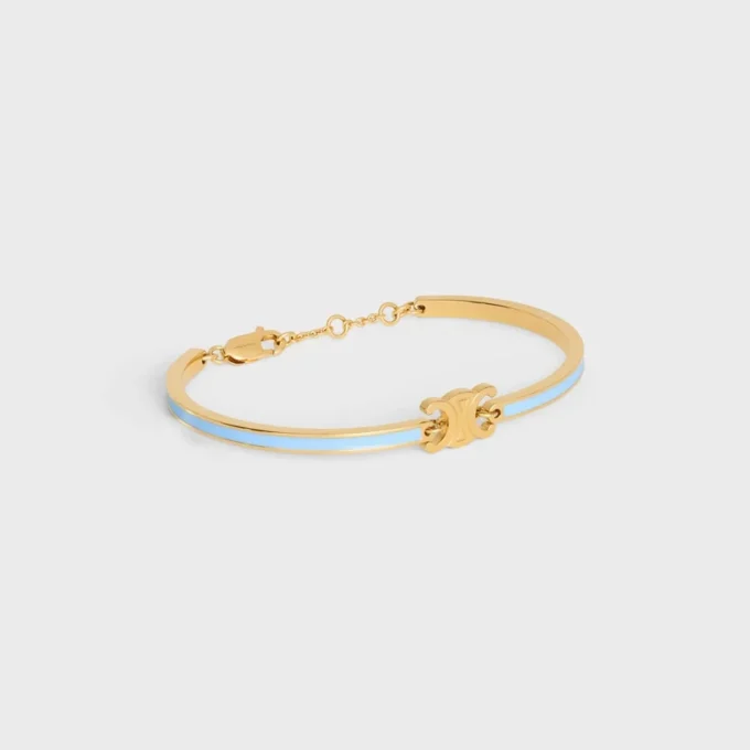 Triomphe ledat armband i emalj och mässing med guldfinish
