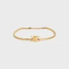Triomphe ledat armband i mässing med guldfinish