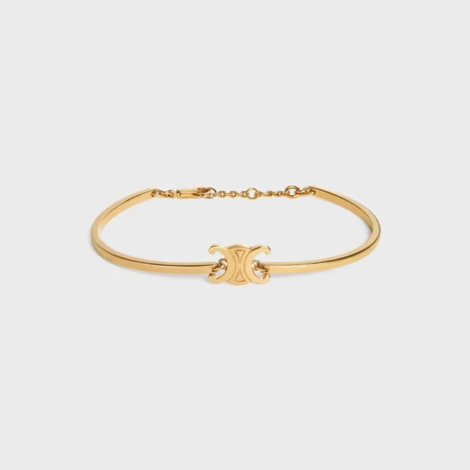 Triomphe ledat armband i mässing med guldfinish