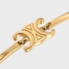 Triomphe ledat armband i mässing med guldfinish